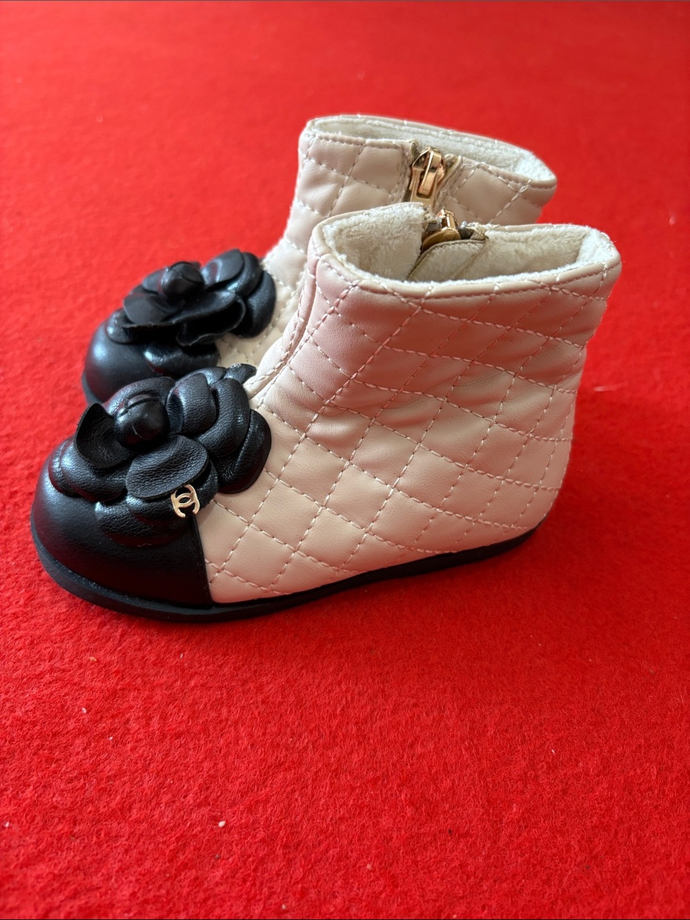 Quilted Ivory and Black Toddler Ankle Boots with Flower Accent